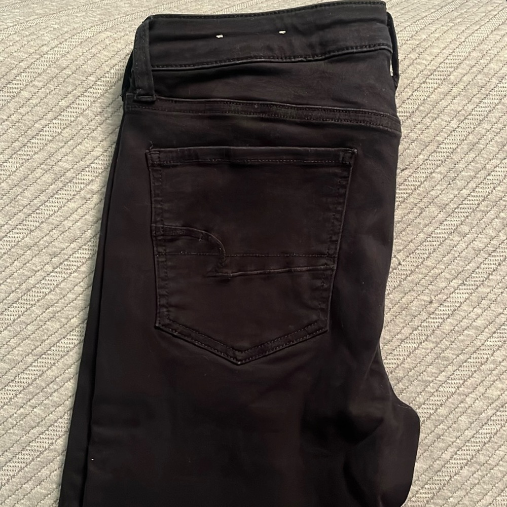 American Eagle AE next level stretch black skinny jeans in a size 12